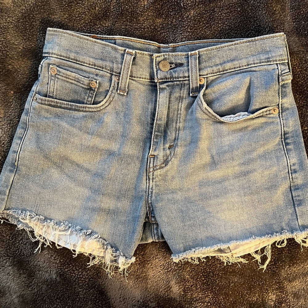 Levi’s 502 distressed shorts